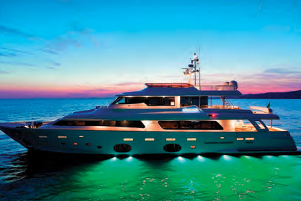 site-security A yacht traveling during sunset.