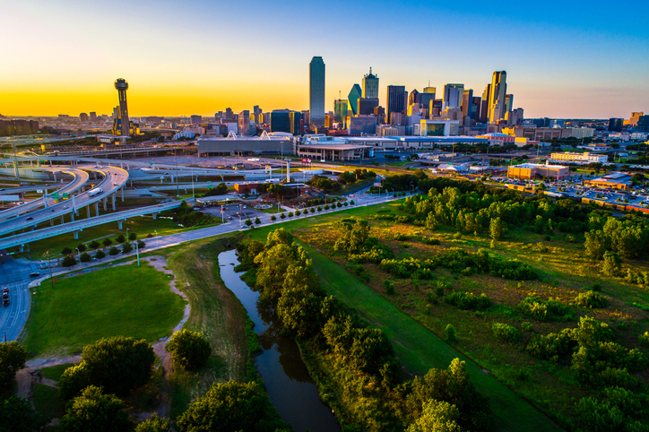 River and green space above Dallas Texas Skyline Cityscape 2019 Security services in Dallas Tx