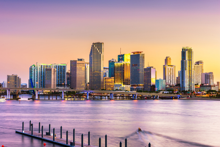 Miami, FL skyline at dusk.