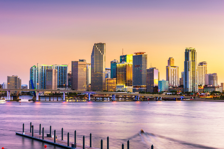 Miami, Florida, USA skyline on Bisayne Bay Miami, FL skyline at dusk.